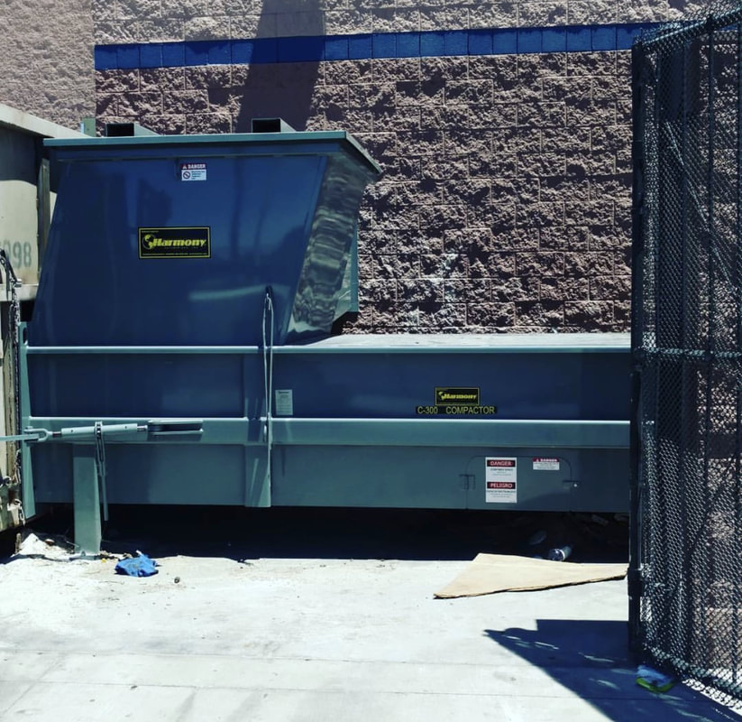 Harmony C-300 commercial compactor installed outdoors